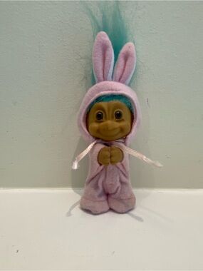 Vintage Russ Berrie TrollDoll Teal Aqua Hair in a pink rabbit Suit
3-1/2”